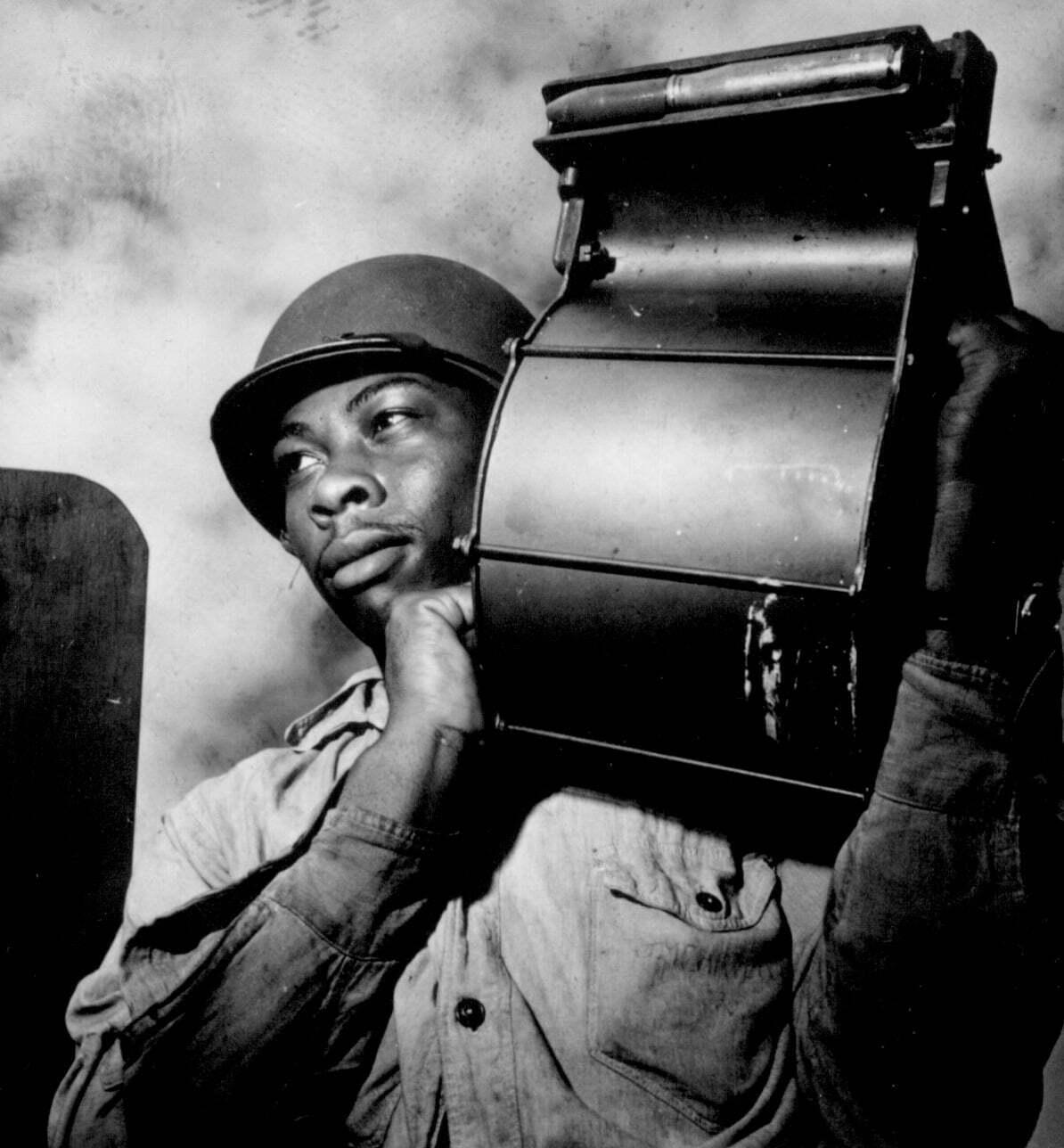 Tuskegee Airman with film projection equipment